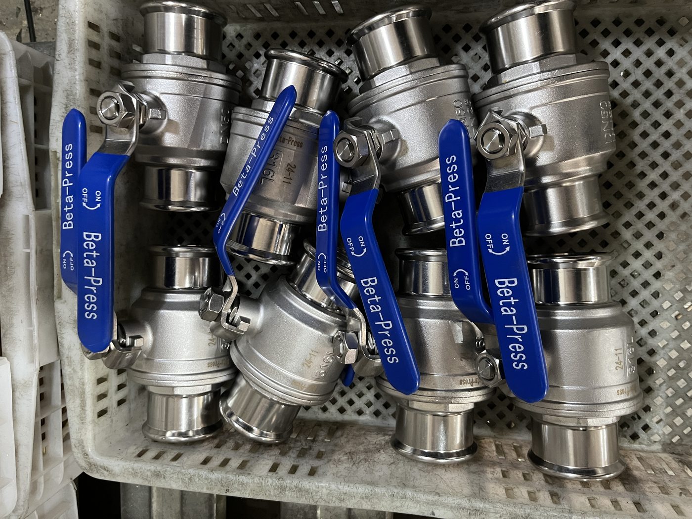 Beta-Press ball valves in tray post laser engraving