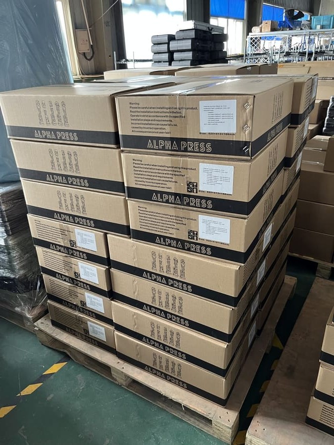 Pallet of Alpha Press cartons prepared for press tool QC inspection