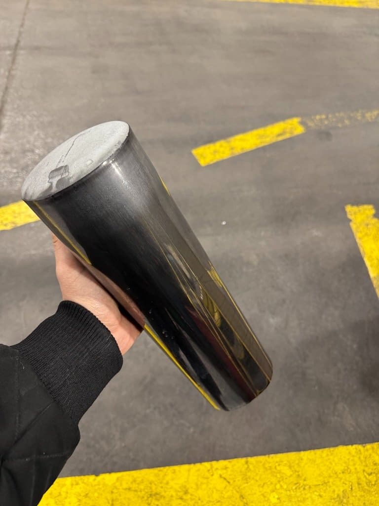 Finished drawn-and-ironed steel cylinder shell with smooth exterior wall and closed dome base