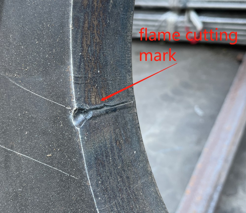 Annotated flame cutting mark at steel plate edge